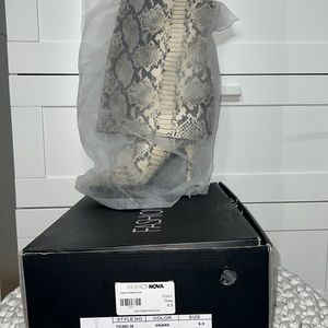 Brand new  Desire Heeled Boot Snake Size 6.5